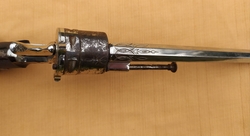 Niklovaný revolver se sklopnou spouští